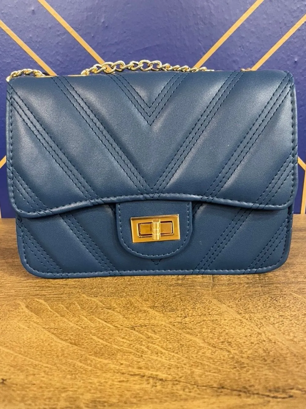 Borsa con cuciture a v e catena
