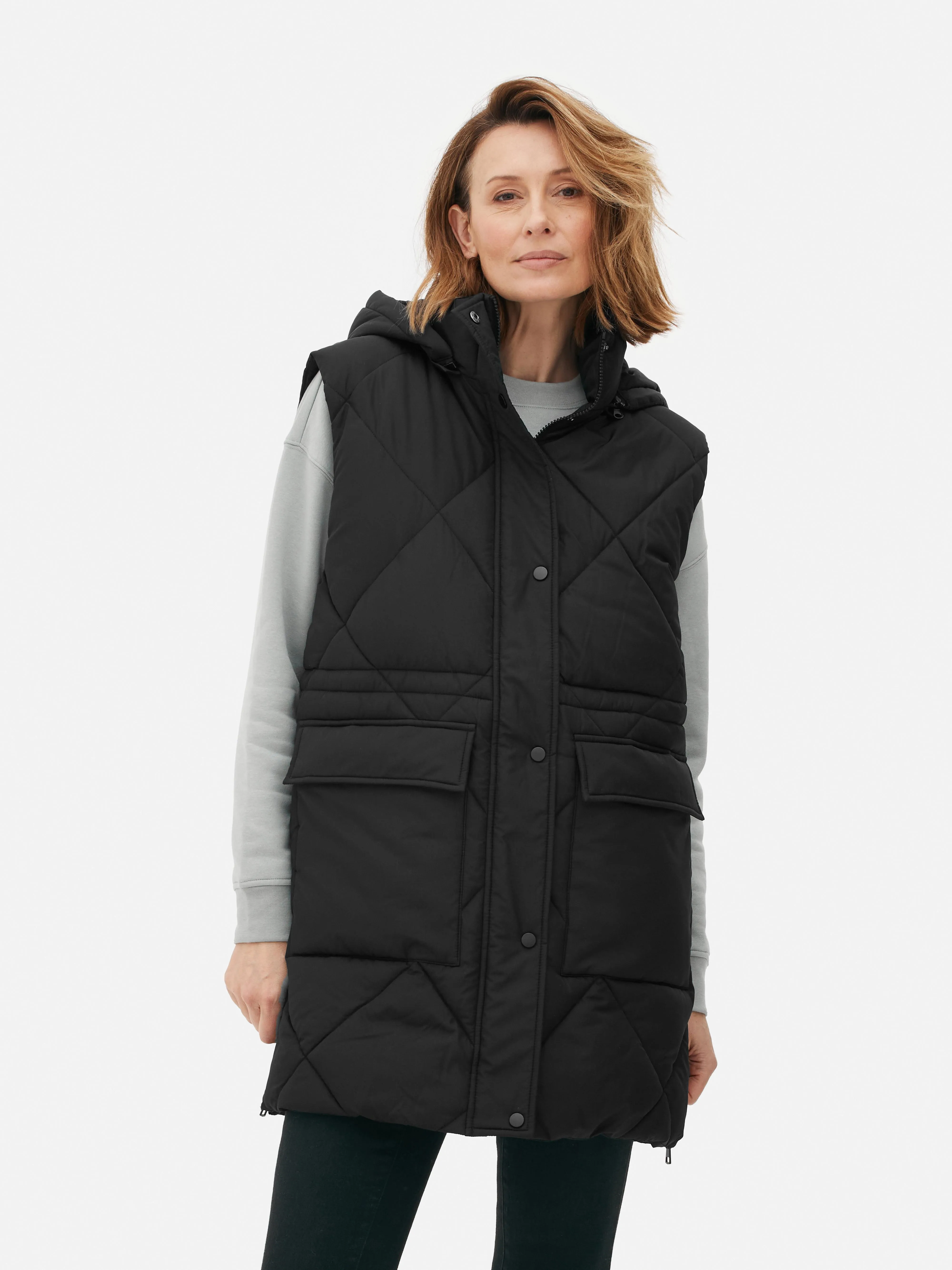 Gilet imbottito lungo con cappuccio