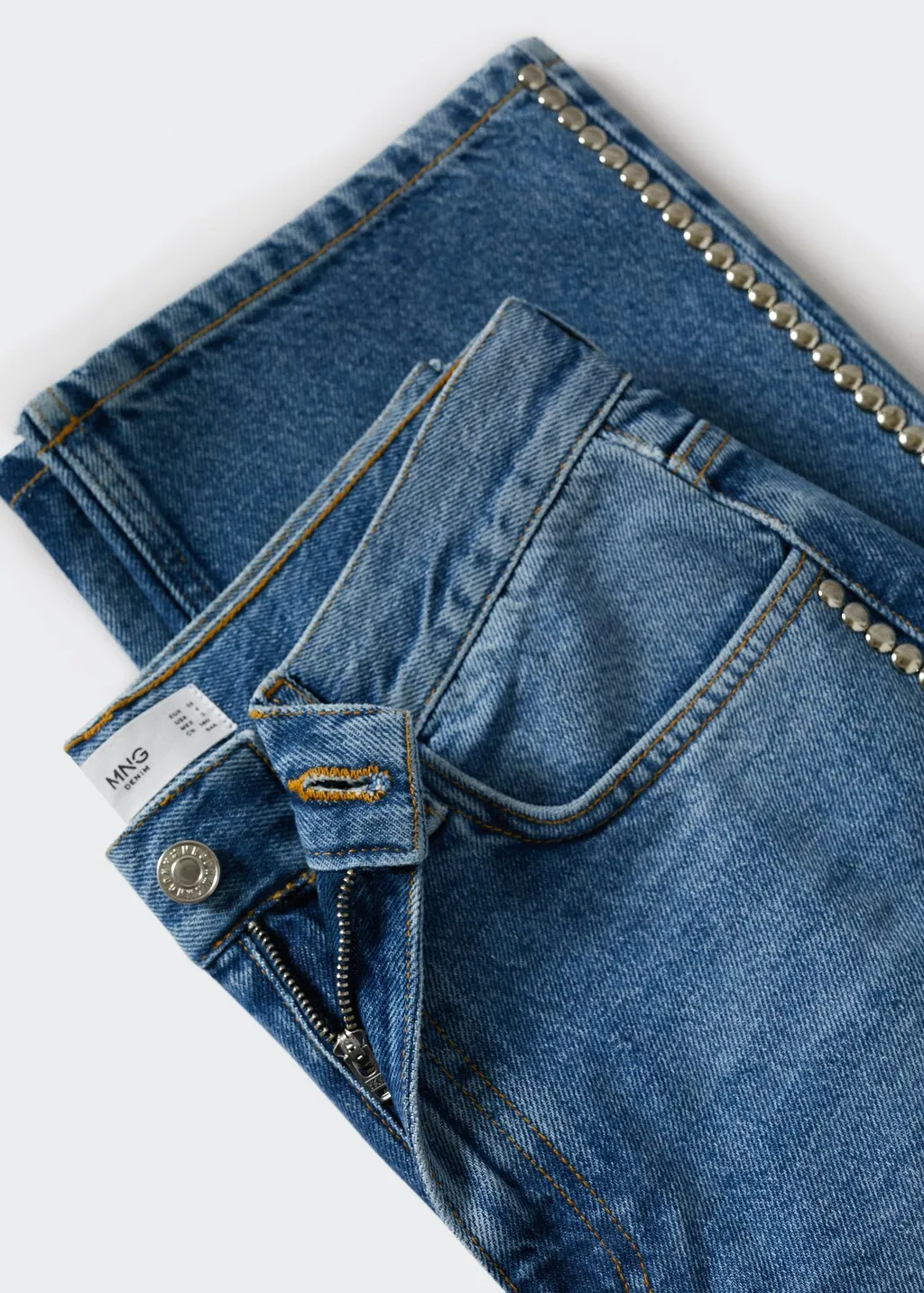 Jeans diritti borchie